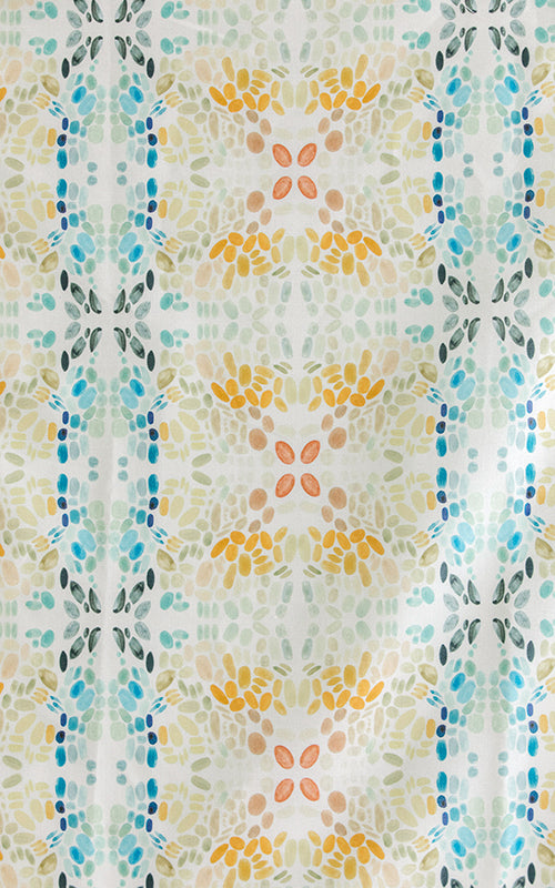 Detail of fabric in a painterly grid print in shades of blue, gray, and orange on a cream field.