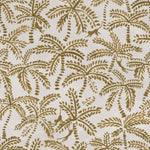 Detail of wallpaper in a playful palm tree and monkey print in gold on a cream field.