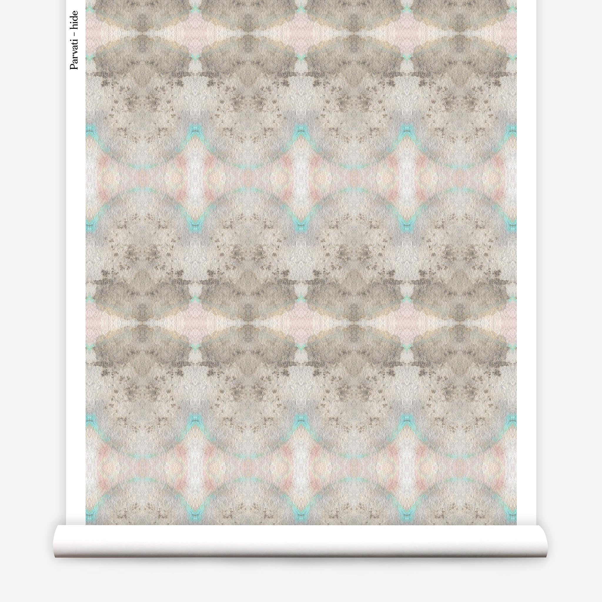 Partially unrolled wallpaper yardage in an abstract ink blot pattern in shades of tan, turquoise and pink.