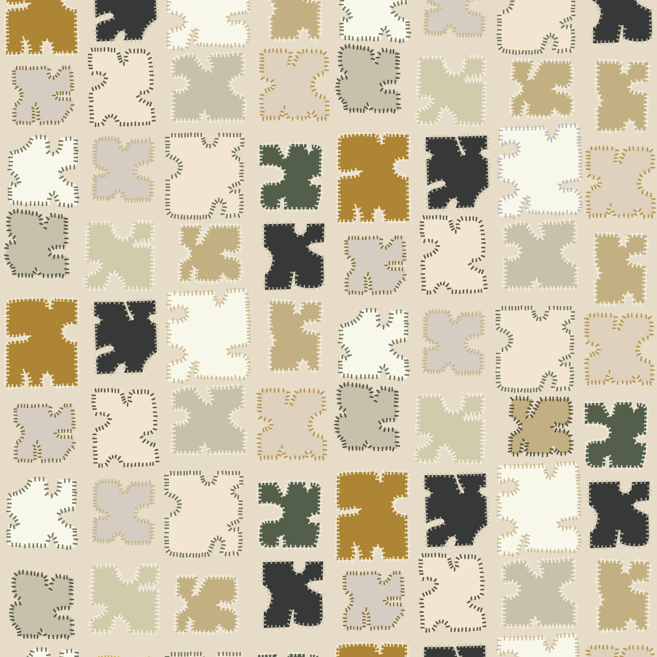 Detail of fabric in a playful patchwork quilt print in neutral shades on a cream field.