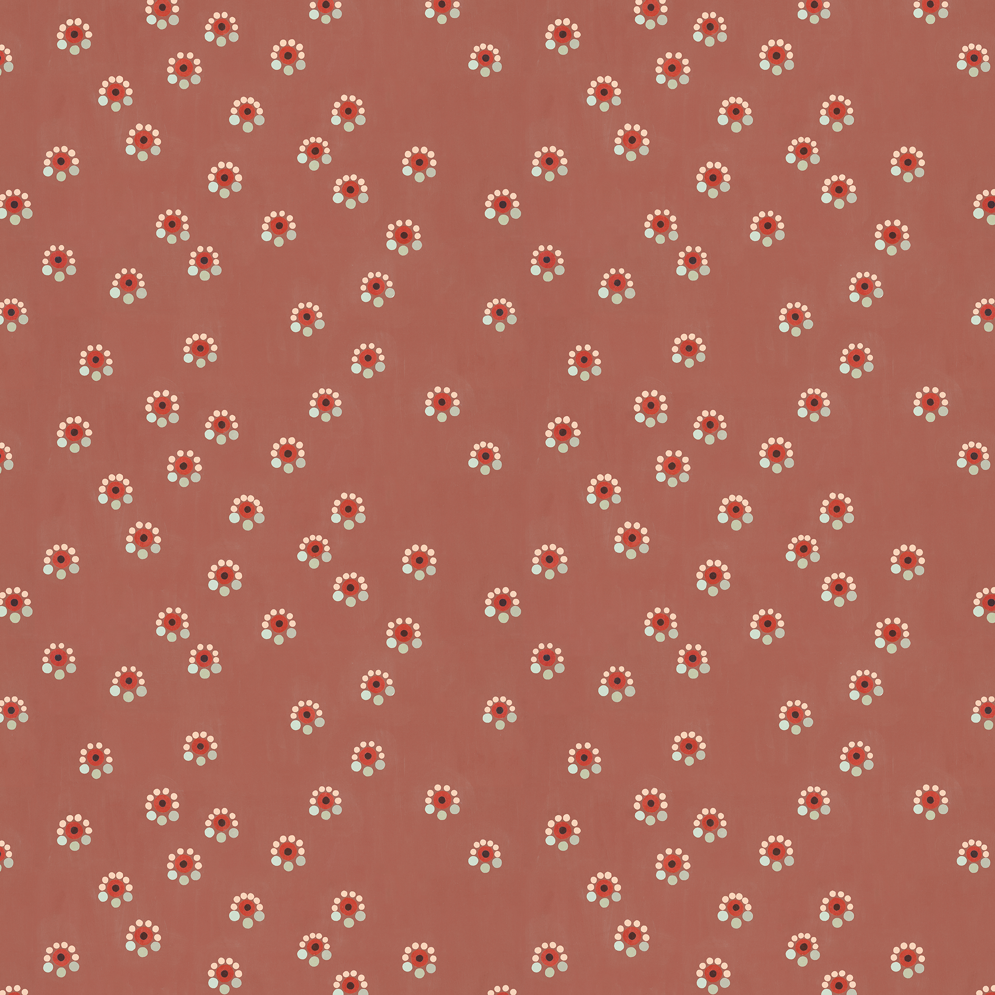 Scaled-out view of fabric in a minimal floral print in shades of pink, red and blue on a maroon field.