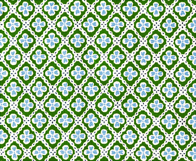 Detail of fabric in a floral lattice print in blue and green on a white field.