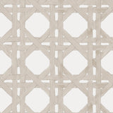 Detail of wallpaper in a geometric lattice print in tan on a white field.