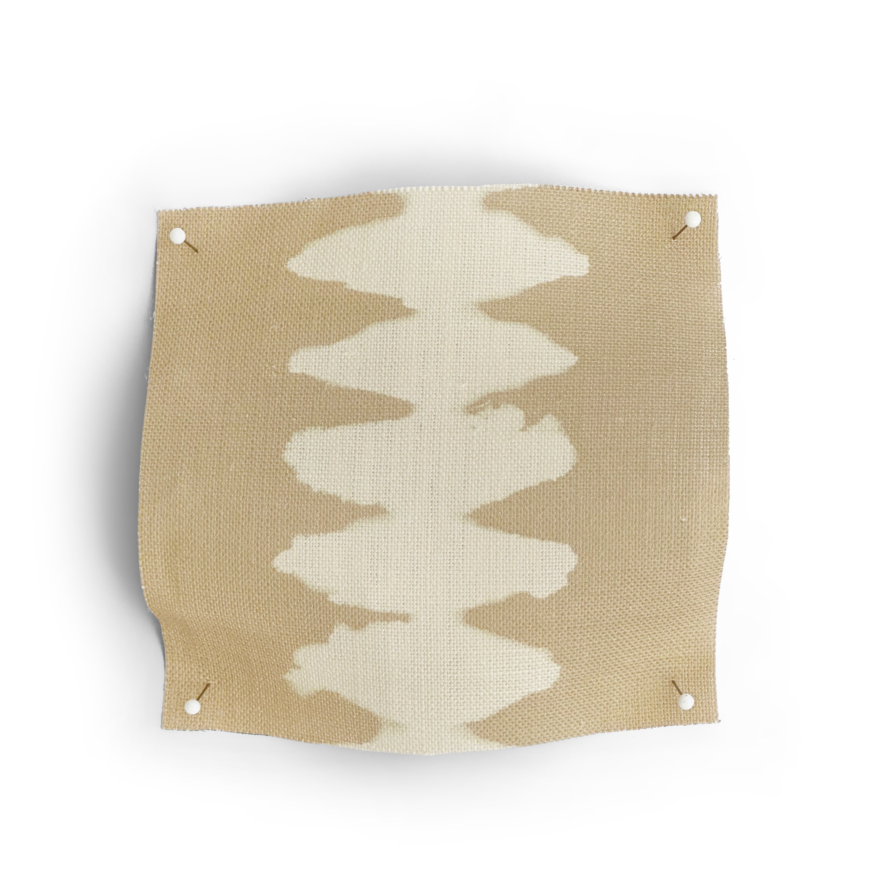 Textile sample with a geometric pattern on a beige background
