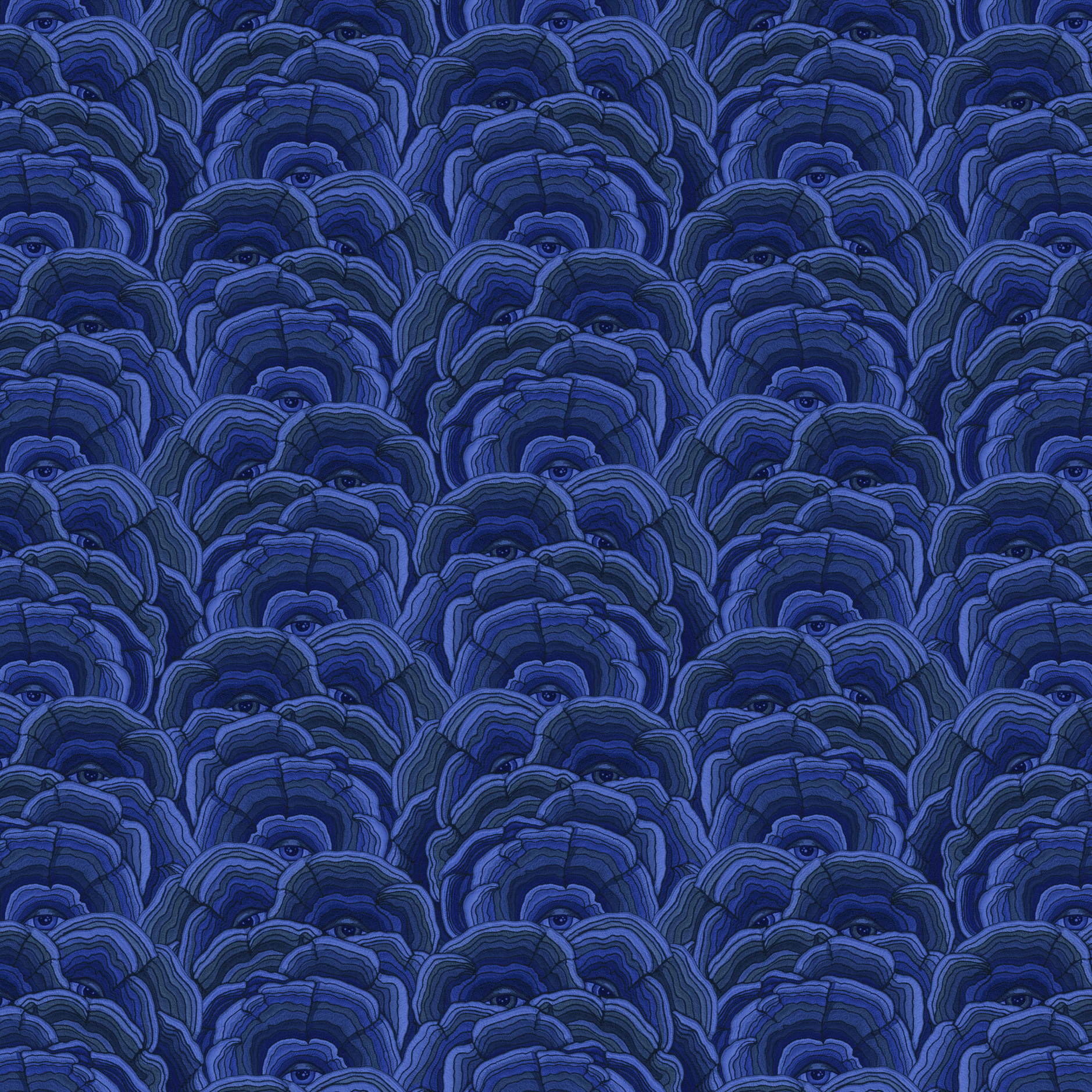 Scaled-out view of wallpaper in a statement print of tree rings with eyes in the middle. Colors are blue and navy.