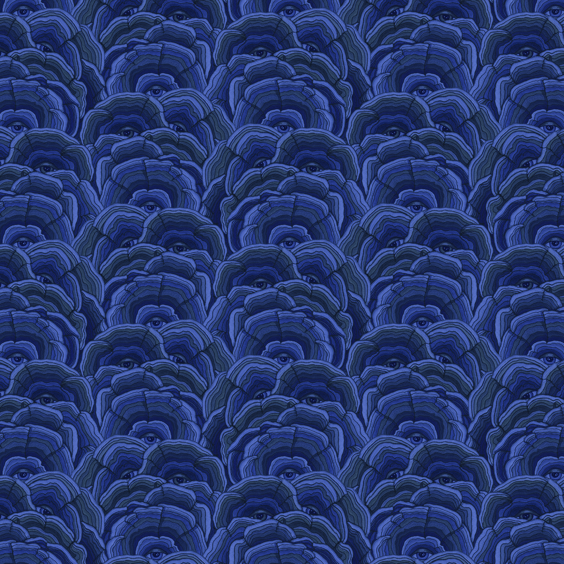 Scaled-out view of wallpaper in a statement print of tree rings with eyes in the middle. Colors are blue and navy.