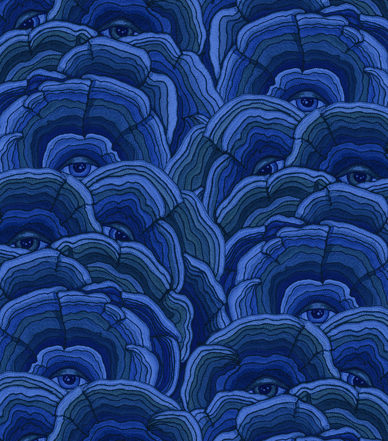 Detail of wallpaper in a statement print of tree rings with eyes in the middle. Colors are blue and navy.