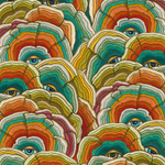 Detail of fabric in a statement print of tree rings with eyes in the middle. Colors are turquoise, orange and yellow.