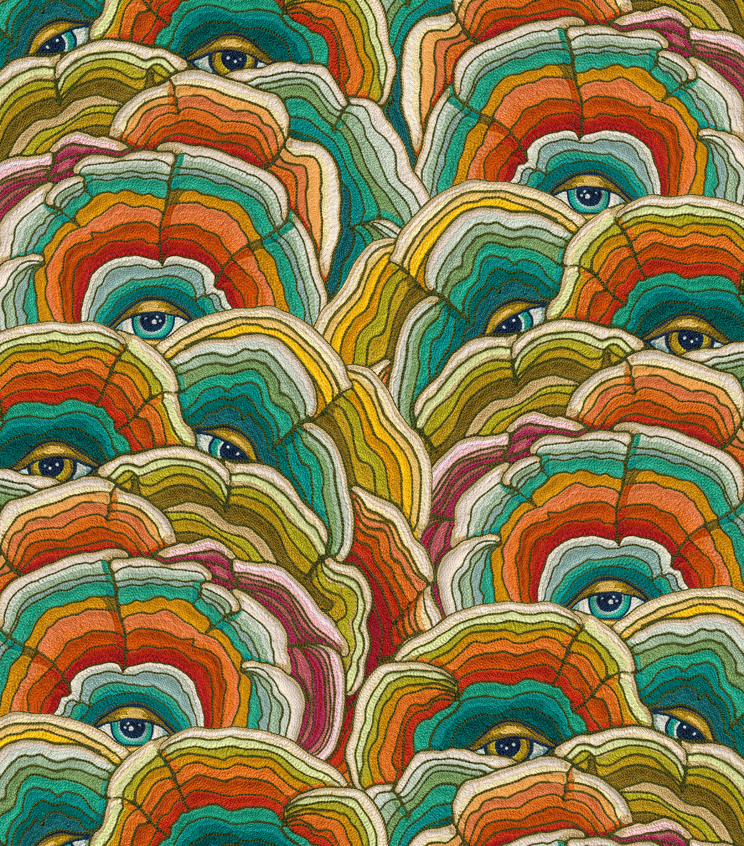 Detail of fabric in a statement print of tree rings with eyes in the middle. Colors are turquoise, orange and yellow.