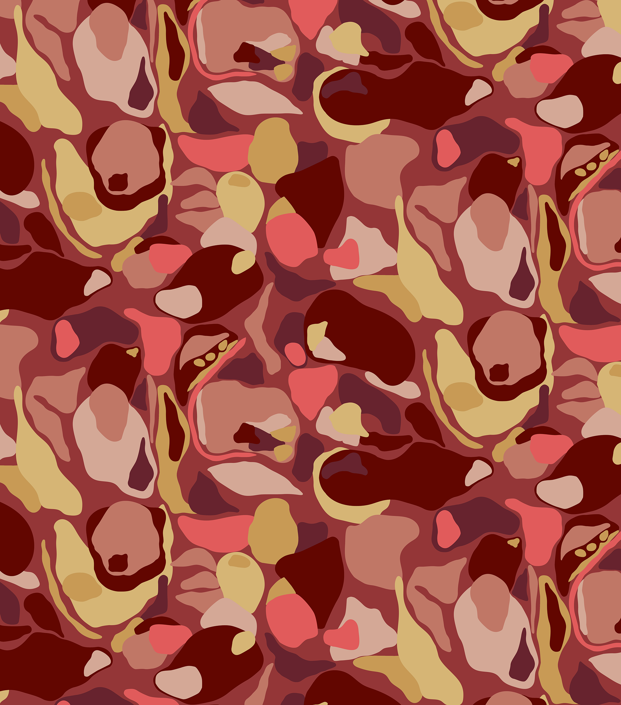 Detail of fabric in a painterly abstract print in shades of yellow, pink and red.