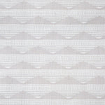 Swatch of linen fabric in a linear pattern with a sand dune-shaped triangle stripe motif in shades of cream and white.