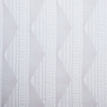 Sheer linen fabric swatch in a horizontal stripe pattern broken with triangluar shapes, in shades of white.