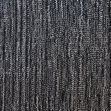 Broadloom carpet swatch in a textural pattern in a black design