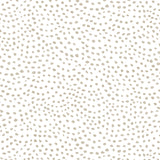 Detail of wallpaper in a scalloped dot print in tan on a white field.