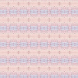 Detail of wallpaper in a gridded paint splatter print in shades of pink, blue, tan and white.