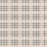 Detail of fabric in a squiggly check pattern in pink, blue and brown on a light blue field.