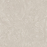 Detail of wallpaper in a playful abstract sun print in white on a cream field.