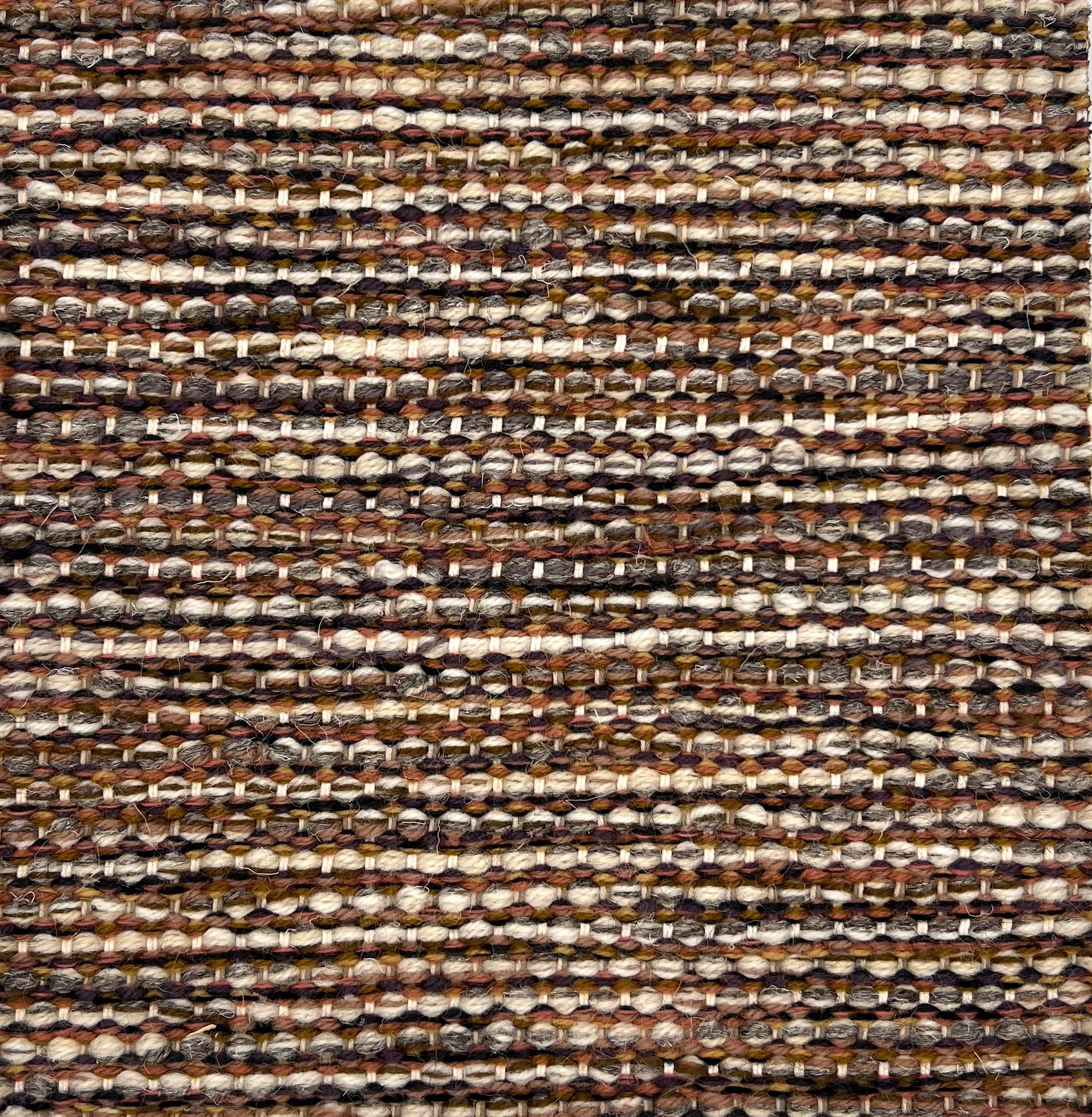 Textural flatweave rug in a heathered brown and cream design.