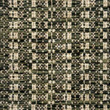 Textural flatweave rug in a striped check in green and tan.