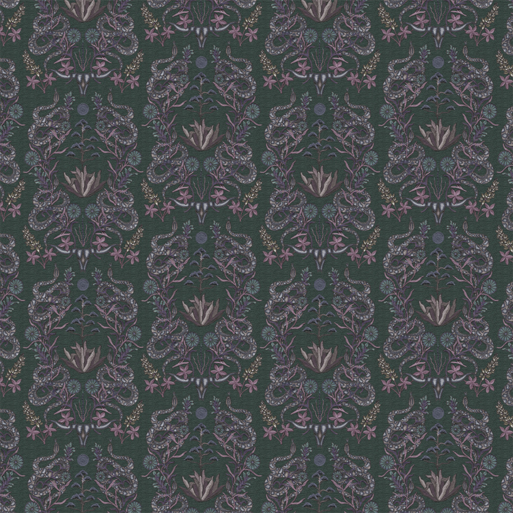 Scaled-out view of wallpaper in a statement desert print with snakes, cow skulls and flowering plants. Field is green.