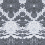 Detail of wallpaper in a painterly ikat print in shades of gray and light blue.