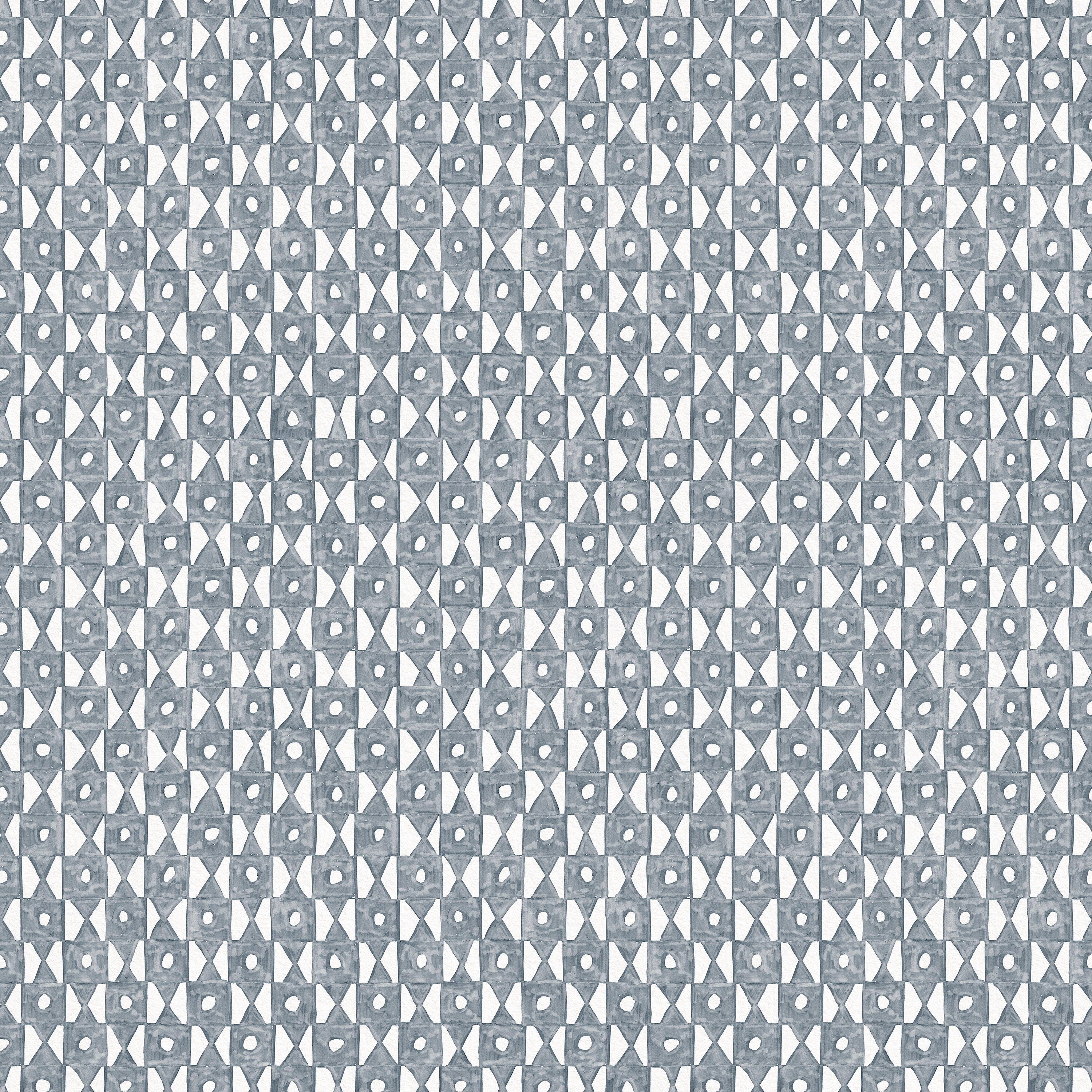 Detail of fabric in a geometric grid print in navy on a white field.