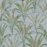 Detail of wallpaper in a painterly palm tree pattern in shades of green and brown on a blue-gray field.