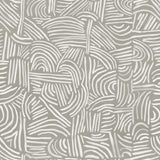 Detail of wallpaper in an abstract linear print in white on a sage field.