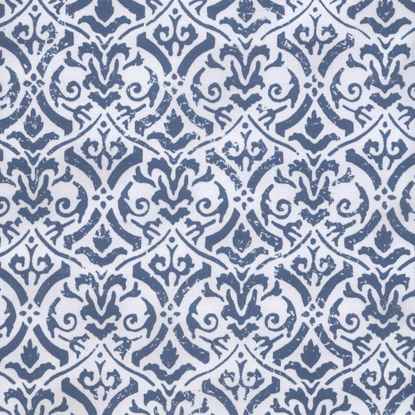 Detail of fabric in a botanical damask print in navy on a light blue field.