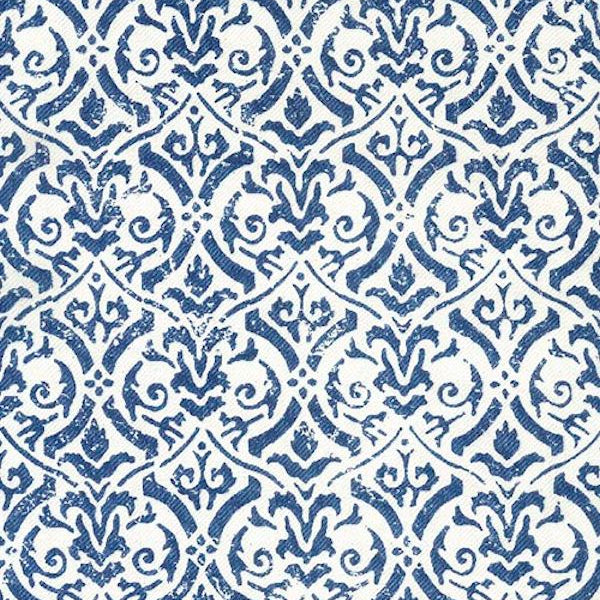 Detail of fabric in a botanical damask print in navy on a white field.