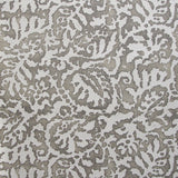 Wallpaper in a botanical paisley print in white on a light brown field.