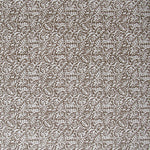 Detail of wallpaper in a dense paisley print in white on a brown field.