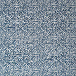 Detail of wallpaper in a dense paisley print in white on a navy field.