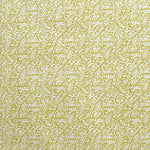 Detail of wallpaper in a dense paisley print in white on a mustard field.