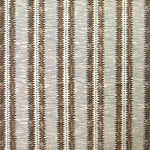 Detail of wallpaper in a dense tribal stripe pattern in shades of cream, gray and brown.