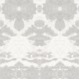 Detail of wallpaper in a painterly ikat print in shades of gray and cream.