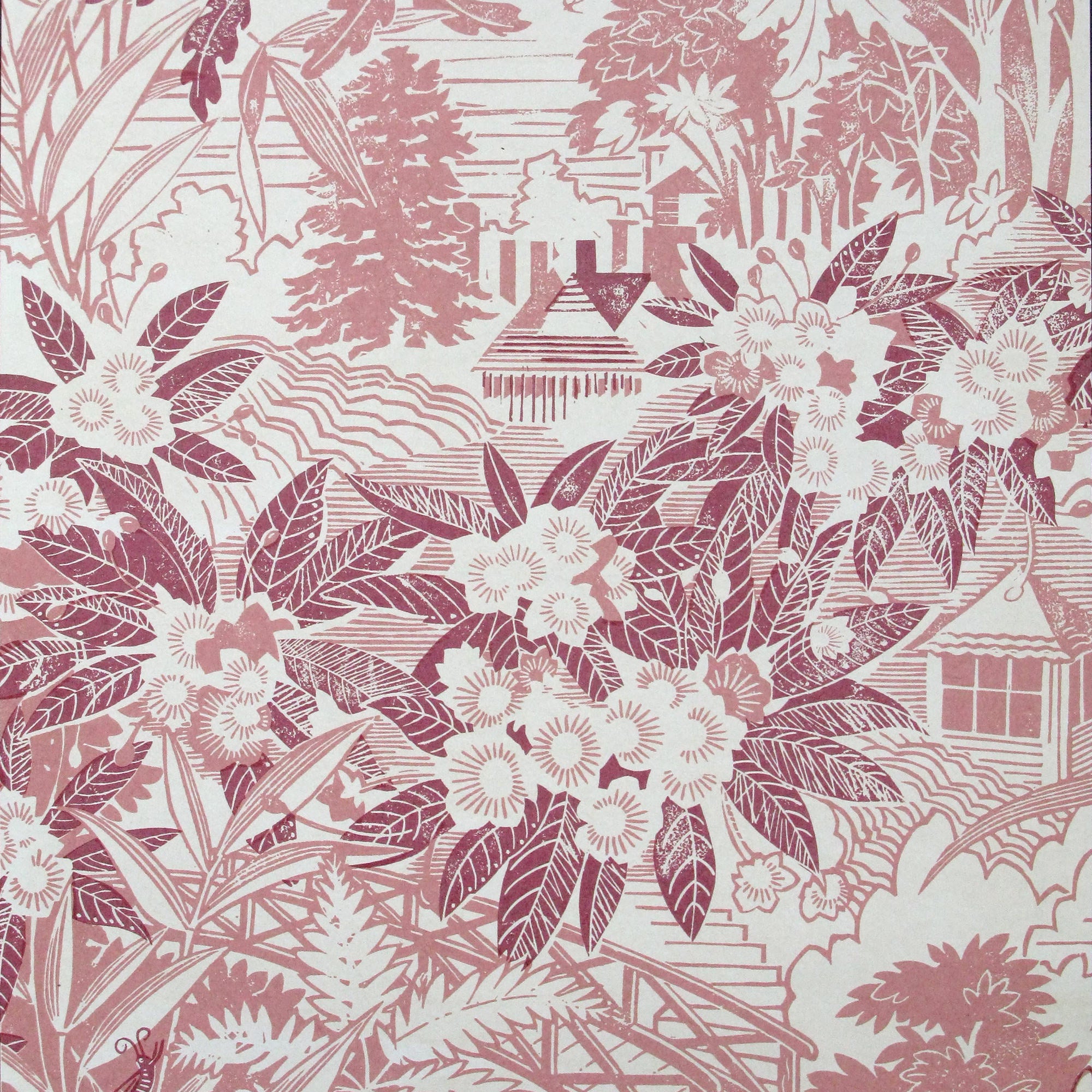 Detail of wallpaper in an intricate botanical, bridge and house print in pink and maroon on a cream field.