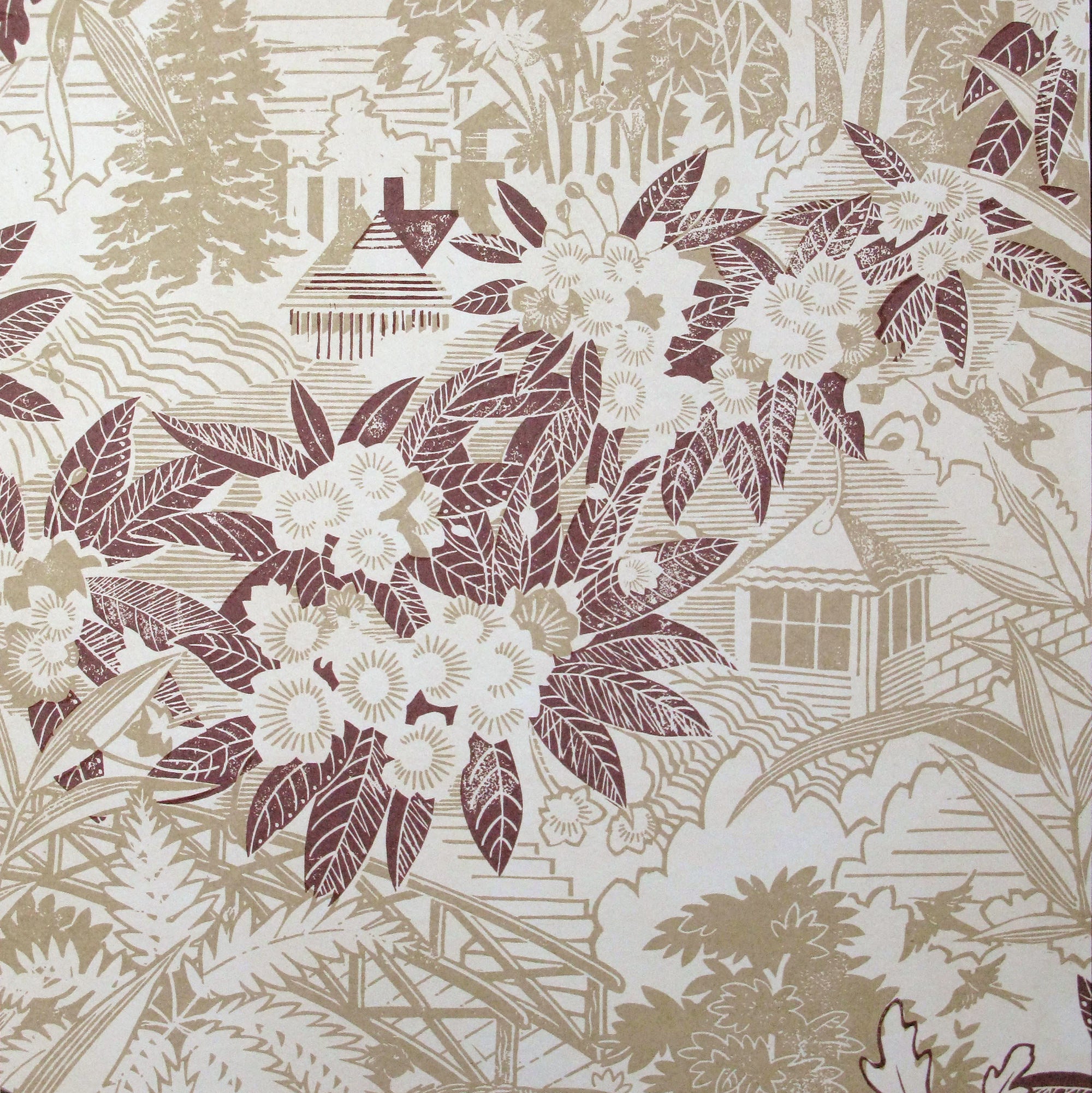 Detail of wallpaper in an intricate botanical, bridge and house print in tan and maroon on a cream field.