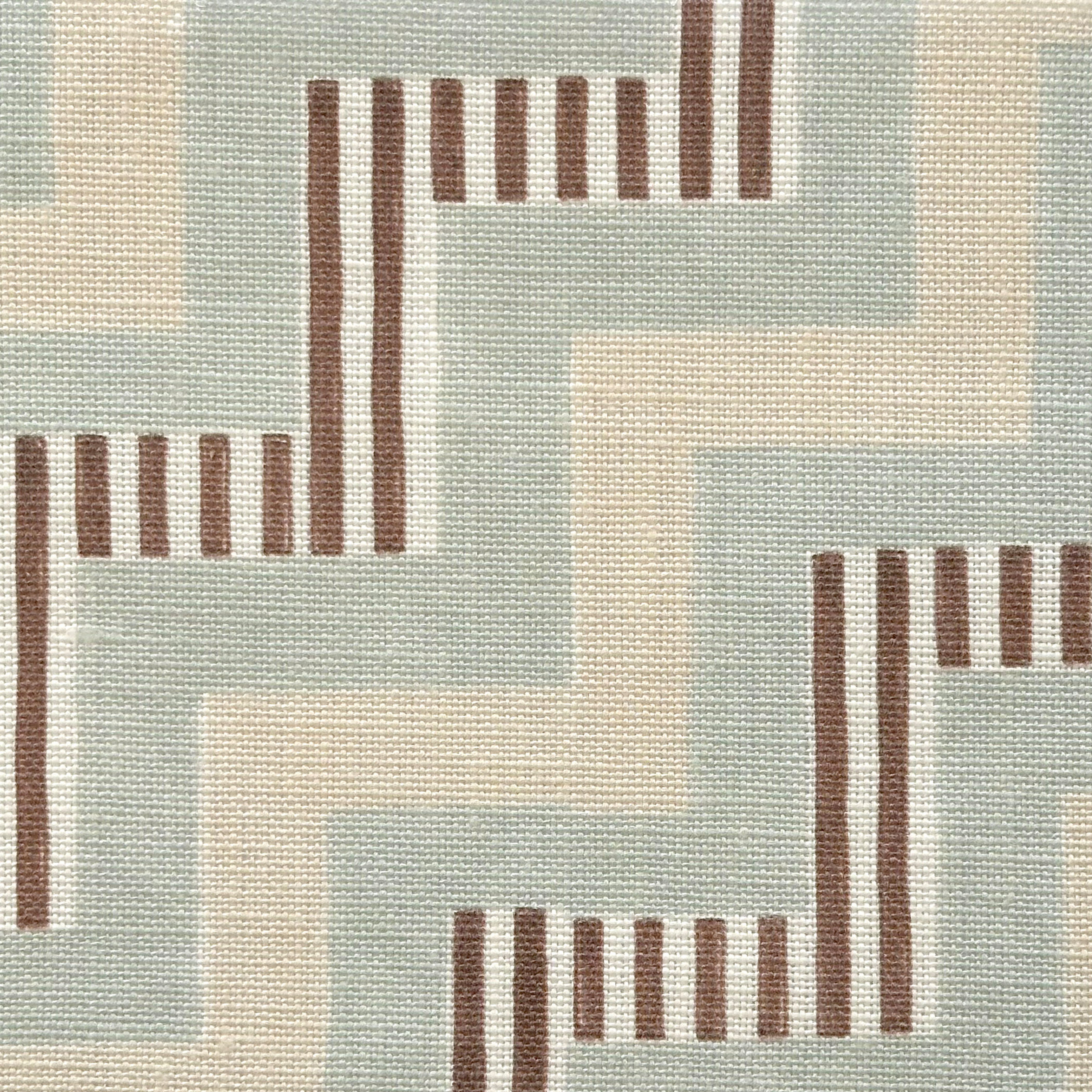 Close-up of fabric in a playful zigzag stripe print in shades of beige, blue and brown.