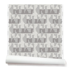Wallpaper roll with a pattern of pale grey geometric vessel shapes over a white background with soft grey horizontal stripes.