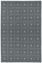 Full size Boe rug in Argento, featuring a pattern of curved segments in grey with white circles on a blue field. 
