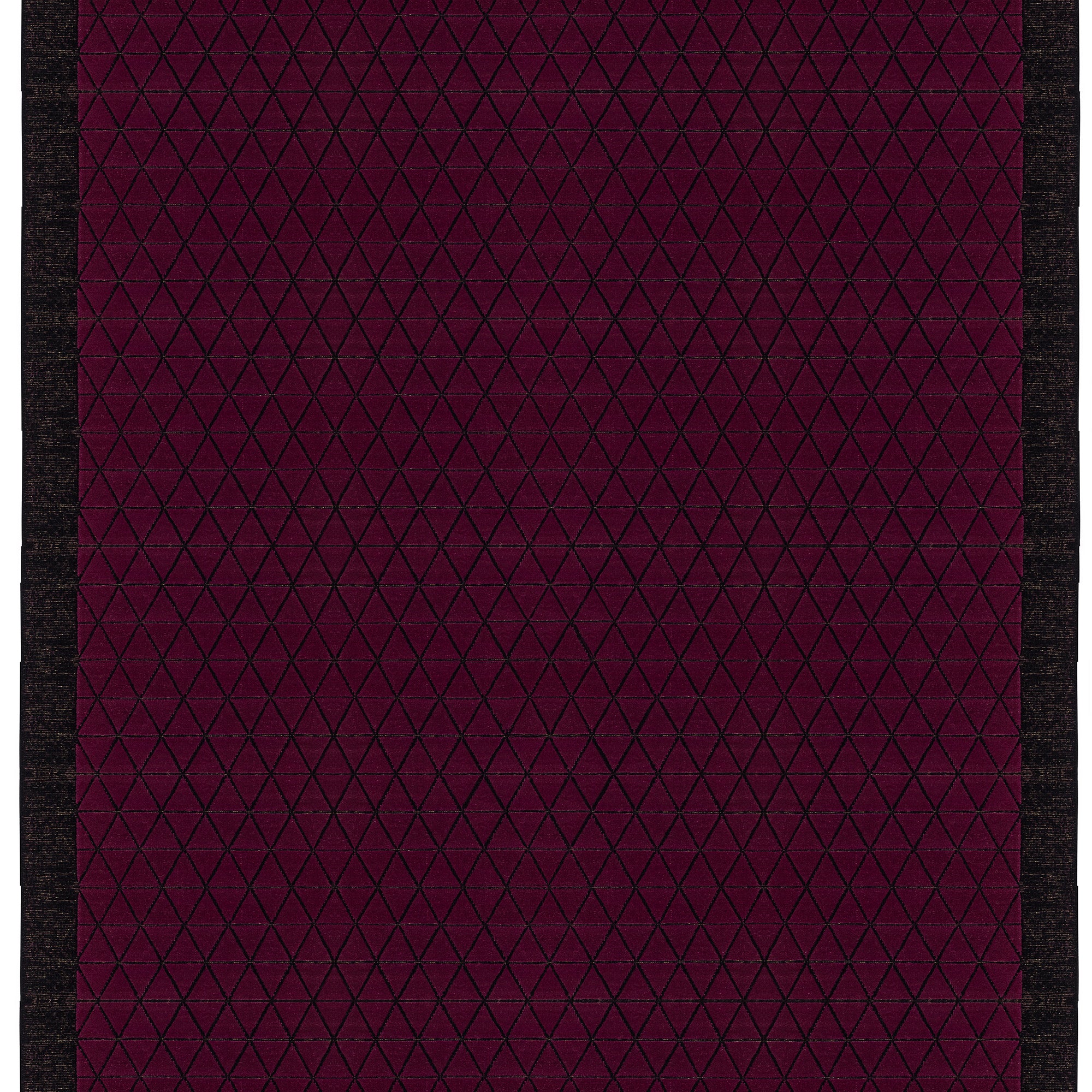 Full size Bucky Rug in berry, features a wide black border with a wine colored lattice field with a metallic sheen. 