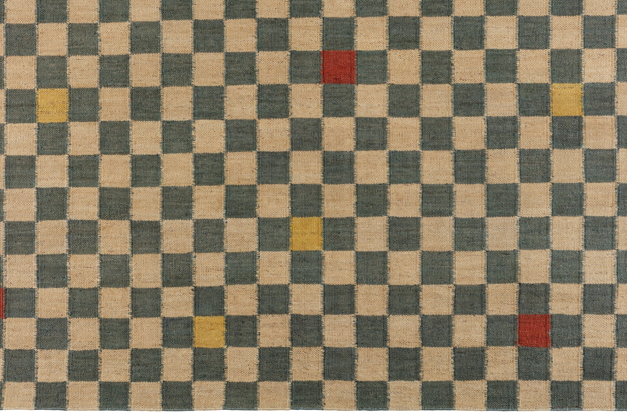 Detail of the Checkerboard Rug in bishop, a blue and white checkered pattern with random accents of red and yellow. 