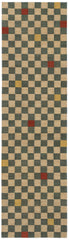 Detail of the Checkerboard Rug in bishop, a blue and white checkered pattern with random accents of red and yellow. 