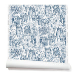 Partially unrolled wallpaper with a pattern of repeating watercolor illustrations of horses, farmers and country houses in navy on a white background.