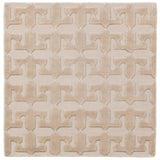 Detail of the Iseo Rug in Pearl, a textural monochromatic abstract geometric pattern in ivory. 
