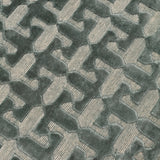 Detail of the Iseo Rug in Winter Sky, a textural monochromatic abstract geometric pattern in slate grey. 