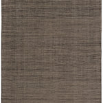 Moire Rug in Rockpool, a subtle striated pattern tan and black. 