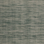Detail of the Moire Rug in Sea Breeze, a subtle striated pattern in teal and off white. 