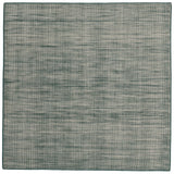 Sample of the Moire Rug in Sea Breeze, a subtle striated pattern in teal and off white. 
